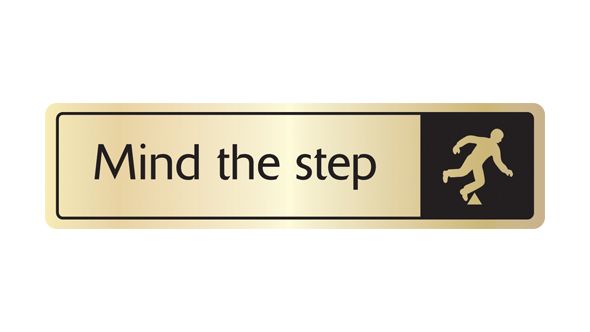 Mind the step with symbol. Black on gold. F/M