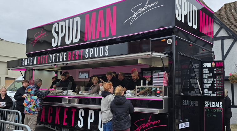 Spud Man jacket potato street food van with queues in the UK